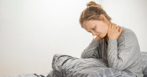 Por que adoecemos Mulher doente na cama